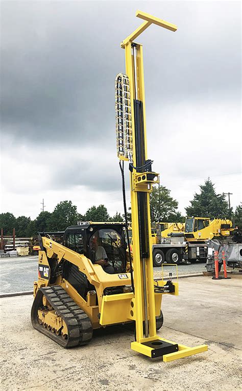 drill mast + skid steer|skid steer drilling attachment.